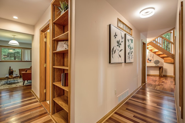 10985 E Pleasant Lake Rd, Manchester, MI 48158 - corridor with healthy amount of natural light, hardwood / wood-style floors, baseboards, and recessed lighting