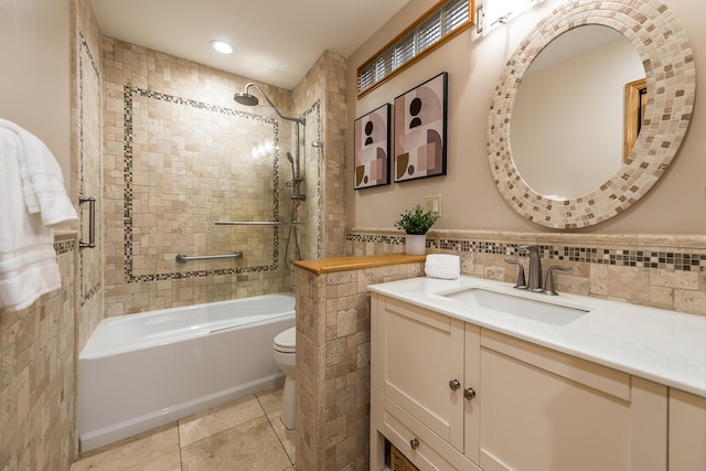 10985 E Pleasant Lake Rd, Manchester, MI 48158 - full bathroom with tile walls, vanity, toilet, shower / bathtub combination, and tile patterned floors