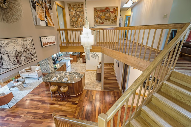 10985 E Pleasant Lake Rd, Manchester, MI 48158 - stairway featuring wood finished floors