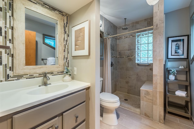 10985 E Pleasant Lake Rd, Manchester, MI 48158 - full bath featuring toilet, vanity, and tiled shower