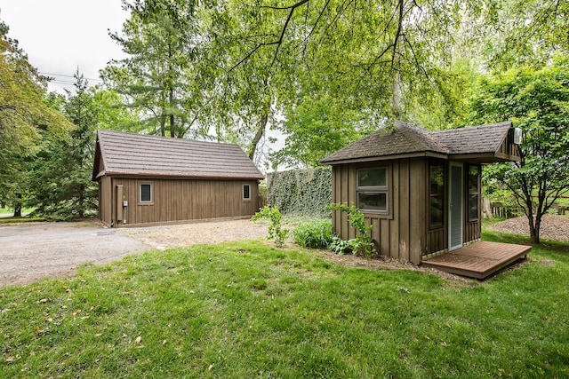 10985 E Pleasant Lake Rd, Manchester, MI 48158 - view of green lawn with an outdoor structure
