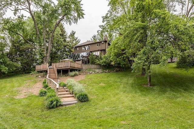 10985 E Pleasant Lake Rd, Manchester, MI 48158 - view of green lawn featuring stairway and a deck