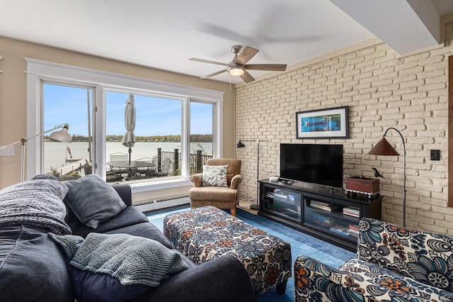 447 Paradise Ln, Horton, MI 49246 - living room featuring baseboard heating, ceiling fan, and brick wall