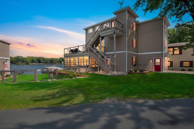 67592 95th Ave, Dowagiac, MI 49047 - view of side of home with stairway, a water view, and a balcony