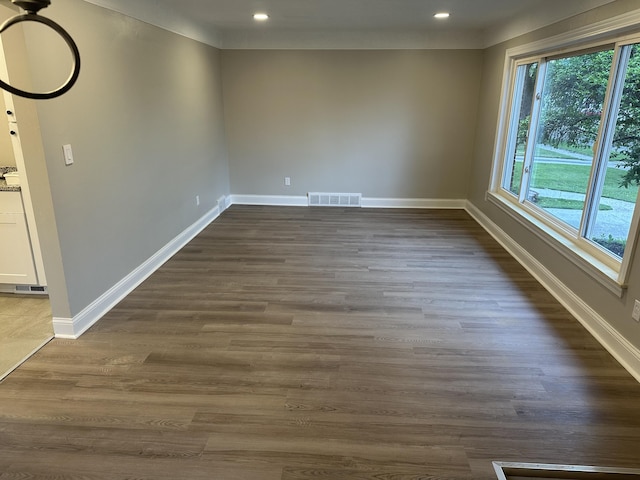 7150 Shenandoah Ave, Allen Park, MI 48101 - empty room with baseboards, recessed lighting, and dark wood-type flooring