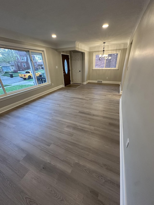 7150 Shenandoah Ave, Allen Park, MI 48101 - unfurnished dining area featuring a chandelier, dark wood finished floors, recessed lighting, and baseboards