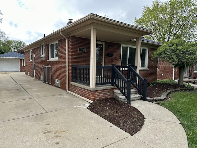7150 Shenandoah Ave, Allen Park, MI 48101 - ranch-style house with brick siding, an outdoor structure, a garage, a porch, and driveway