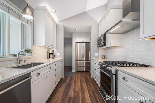 1334 Thornberry Ct W, Grand Rapids, MI 49546 - kitchen featuring a sink, stainless steel appliances, white cabinetry, and wall chimney range hood