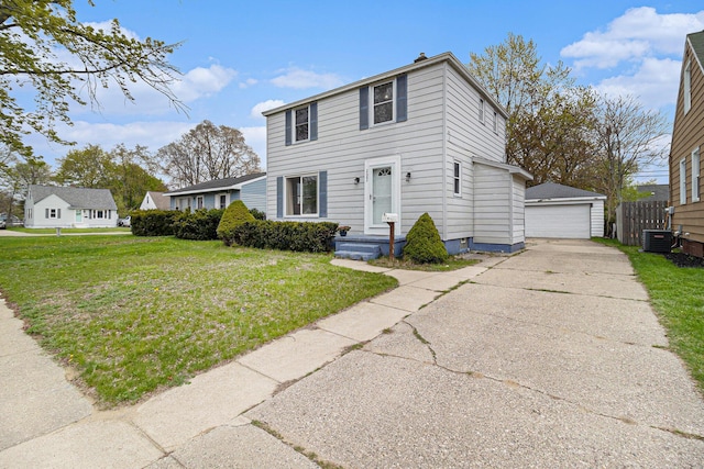 view of front of property with central AC, a front yard, a garage, and an outdoor structure