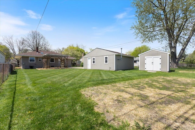 1610 Saunders Cres, Ann Arbor, MI 48103 - view of yard with an outbuilding, a pergola, fence private yard, and a storage unit