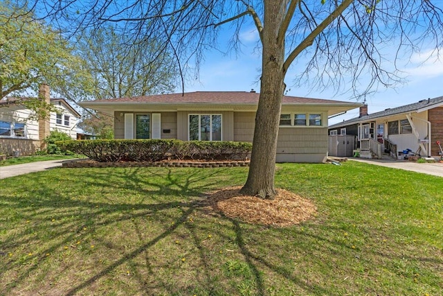 1610 Saunders Cres, Ann Arbor, MI 48103 - ranch-style house with a front yard