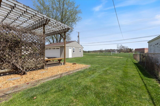 1610 Saunders Cres, Ann Arbor, MI 48103 - view of yard featuring a pergola, fence, a garage, and an outdoor structure