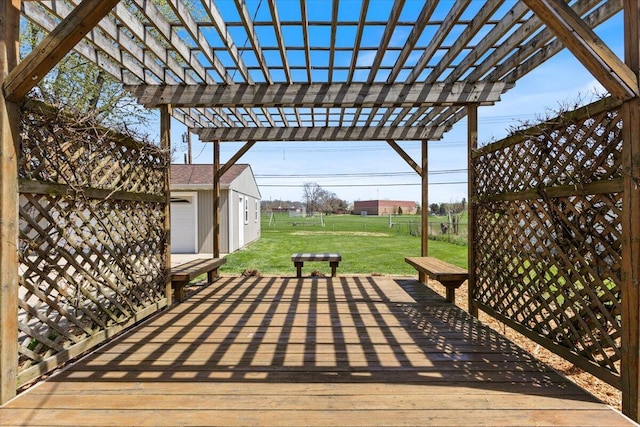 1610 Saunders Cres, Ann Arbor, MI 48103 - deck featuring a yard, a pergola, fence, and an outdoor structure