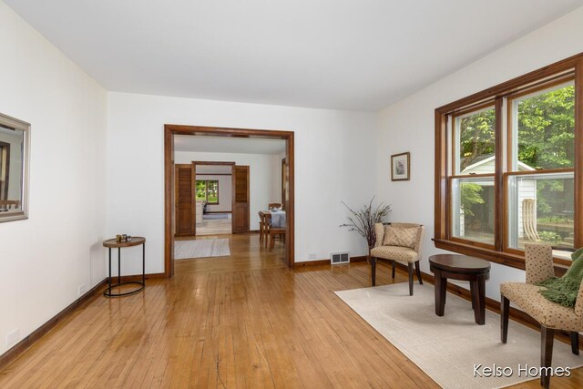 510 Division St, Big Rapids, MI 49307 - sitting room featuring light wood-type flooring and baseboards
