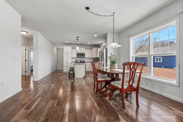 7177 Longview Ct, Delton, MI 49046 - dining room with dark wood-style floors, baseboards, and recessed lighting