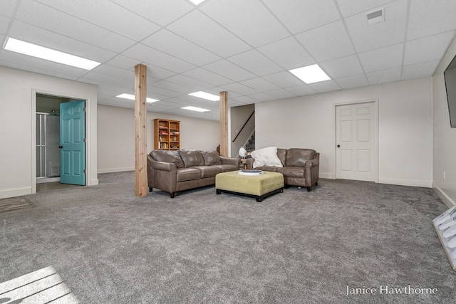 7177 Longview Ct, Delton, MI 49046 - carpeted living room featuring stairs, a paneled ceiling, and baseboards
