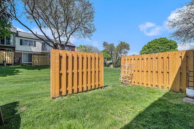 view of yard with fence
