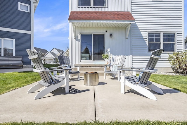 view of patio with an outdoor fire pit