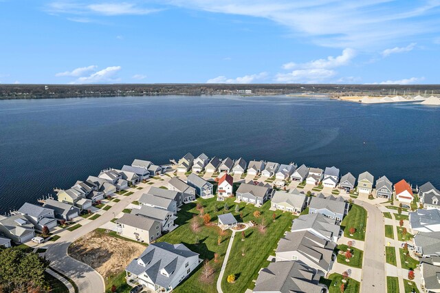 aerial view featuring a water view and a residential view