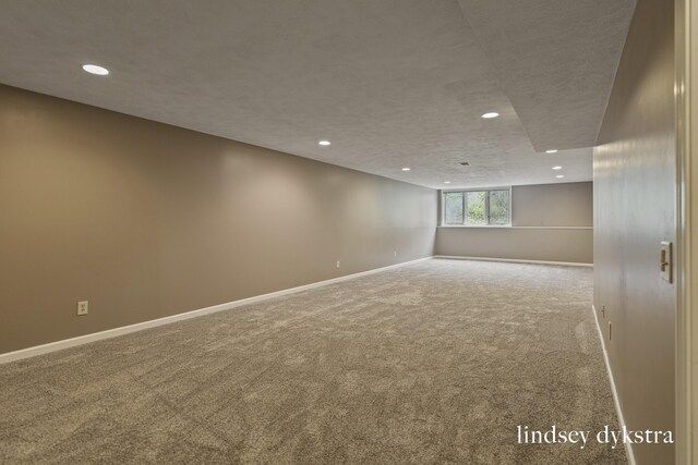 1013 Country Gdns NW, Walker, MI 49534 - interior space featuring baseboards, recessed lighting, and carpet floors