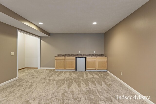 1013 Country Gdns NW, Walker, MI 49534 - bar featuring baseboards, light carpet, recessed lighting, and bar