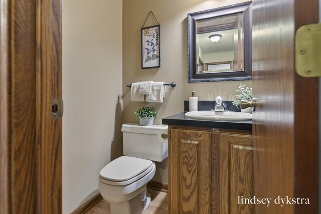 1013 Country Gdns NW, Walker, MI 49534 - bathroom featuring toilet and vanity