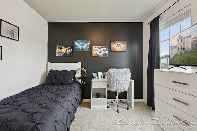 560 Pioneer Trl, Cedar Springs, MI 49319 - bedroom featuring baseboards, carpet flooring, and an accent wall