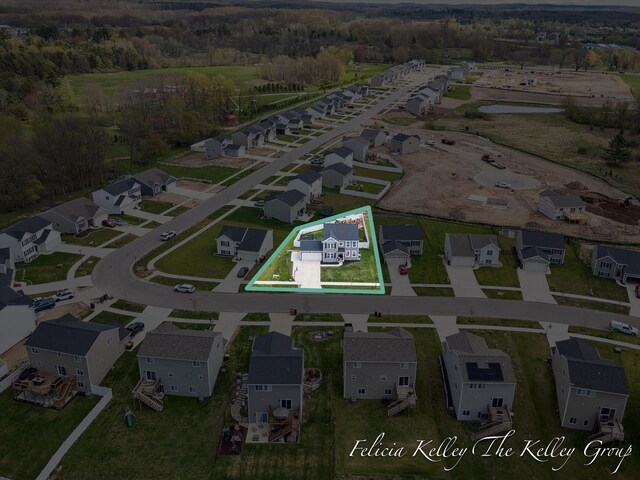 560 Pioneer Trl, Cedar Springs, MI 49319 - drone / aerial view with a residential view