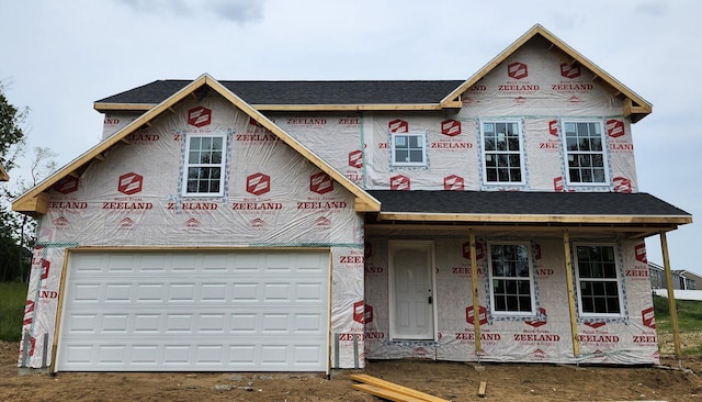 5672 Landrum Trl, Portage, MI 49024 - unfinished property with a porch, a garage, and a shingled roof