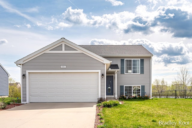 8161 W Sturtevant Ave, Richland, MI 49083 - view of front of home with concrete driveway and a garage