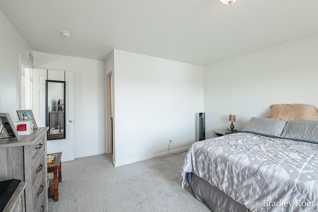 8161 W Sturtevant Ave, Richland, MI 49083 - bedroom featuring light carpet and baseboards