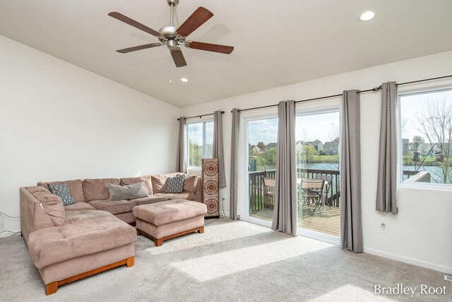 8161 W Sturtevant Ave, Richland, MI 49083 - carpeted living room featuring lofted ceiling, ceiling fan, recessed lighting, baseboards, and a water view