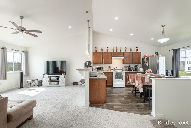 8161 W Sturtevant Ave, Richland, MI 49083 - kitchen featuring freestanding refrigerator, electric range, open floor plan, light countertops, and recessed lighting