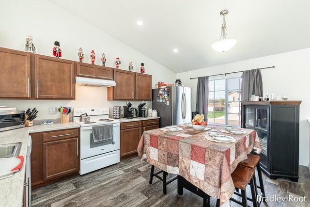 8161 W Sturtevant Ave, Richland, MI 49083 - kitchen featuring freestanding refrigerator, white range with electric stovetop, lofted ceiling, dark wood-style flooring, and light countertops