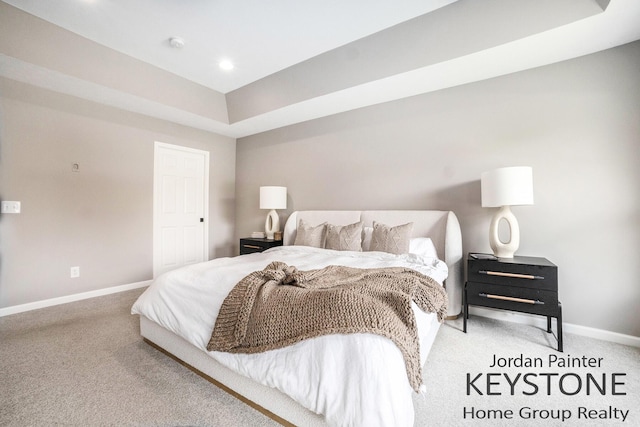 3673 Hunters Way Dr SE, Ada, MI 49301 - carpeted bedroom with baseboards, a raised ceiling, and recessed lighting