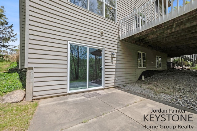 3673 Hunters Way Dr SE, Ada, MI 49301 - view of home's exterior with a patio and an attached carport