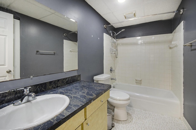 full bath with tile patterned flooring, bathing tub / shower combination, toilet, and vanity