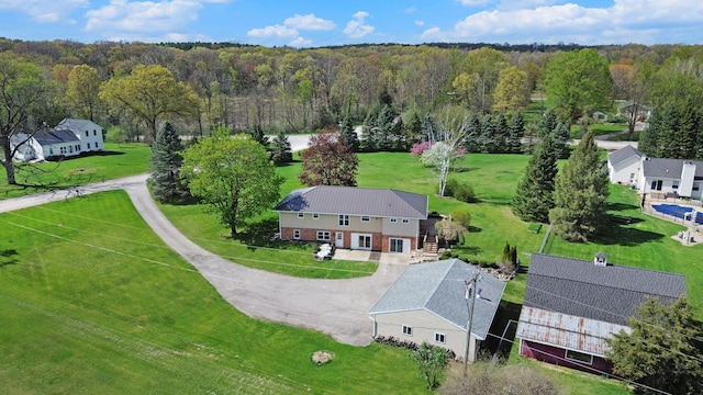 view from above of property featuring a forest