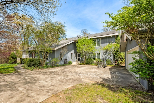 50102 Alpine Blvd, New Buffalo, MI 49117 - mid-century modern home with concrete driveway