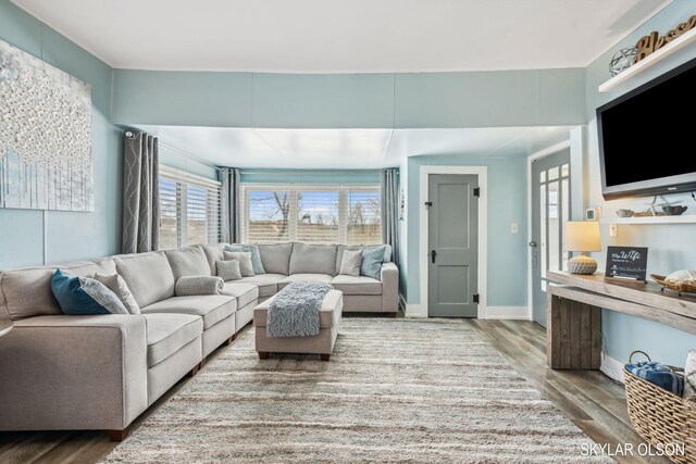 1520 Beach St, Muskegon, MI 49441 - living area featuring wood finished floors and baseboards
