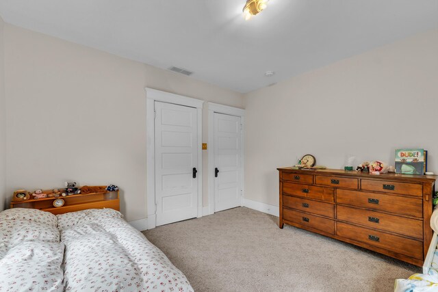 2486 Whitmore Lake Rd, Ann Arbor, MI 48105 - bedroom featuring light carpet