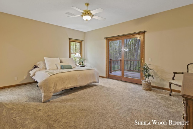 903 10 Mile Rd NW, Sparta, MI 49345 - carpeted bedroom with access to exterior, baseboards, and ceiling fan