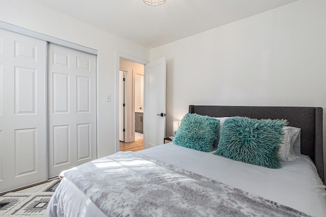 819 W Michigan St, New Buffalo, MI 49117 - bedroom featuring a closet and light wood-style flooring