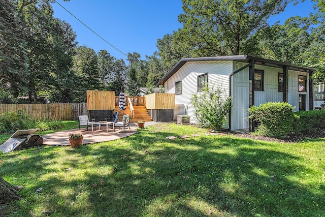 819 W Michigan St, New Buffalo, MI 49117 - view of yard featuring a patio area and central AC unit