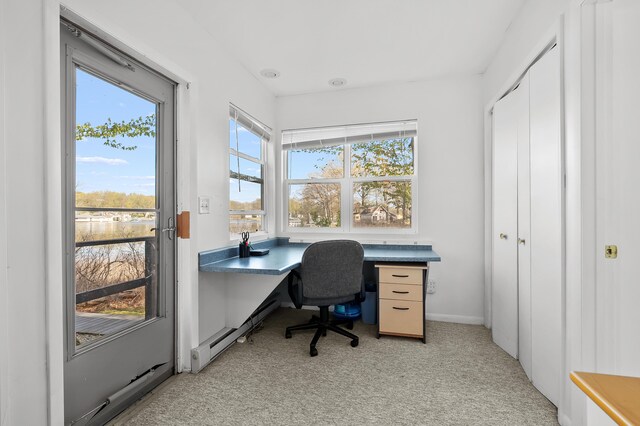 10982 Beech Is, Plainwell, MI 49080 - home office featuring light carpet, a baseboard heating unit, and baseboards
