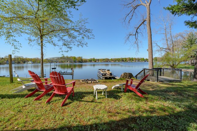 10982 Beech Is, Plainwell, MI 49080 - dock area featuring a water view and a lawn