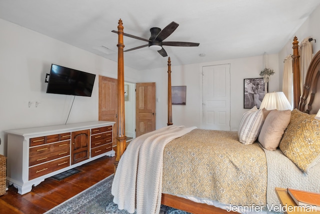 bedroom featuring dark wood-style flooring and a ceiling fan