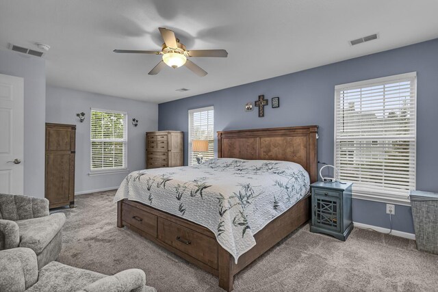 bedroom featuring baseboards, carpet, and ceiling fan