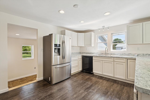 25034 Redfield St, Edwardsburg, MI 49112 - kitchen featuring stainless steel fridge with ice dispenser, black dishwasher, a sink, dark wood finished floors, and healthy amount of natural light