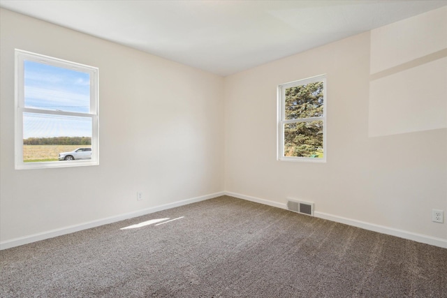 25034 Redfield St, Edwardsburg, MI 49112 - carpeted empty room featuring baseboards